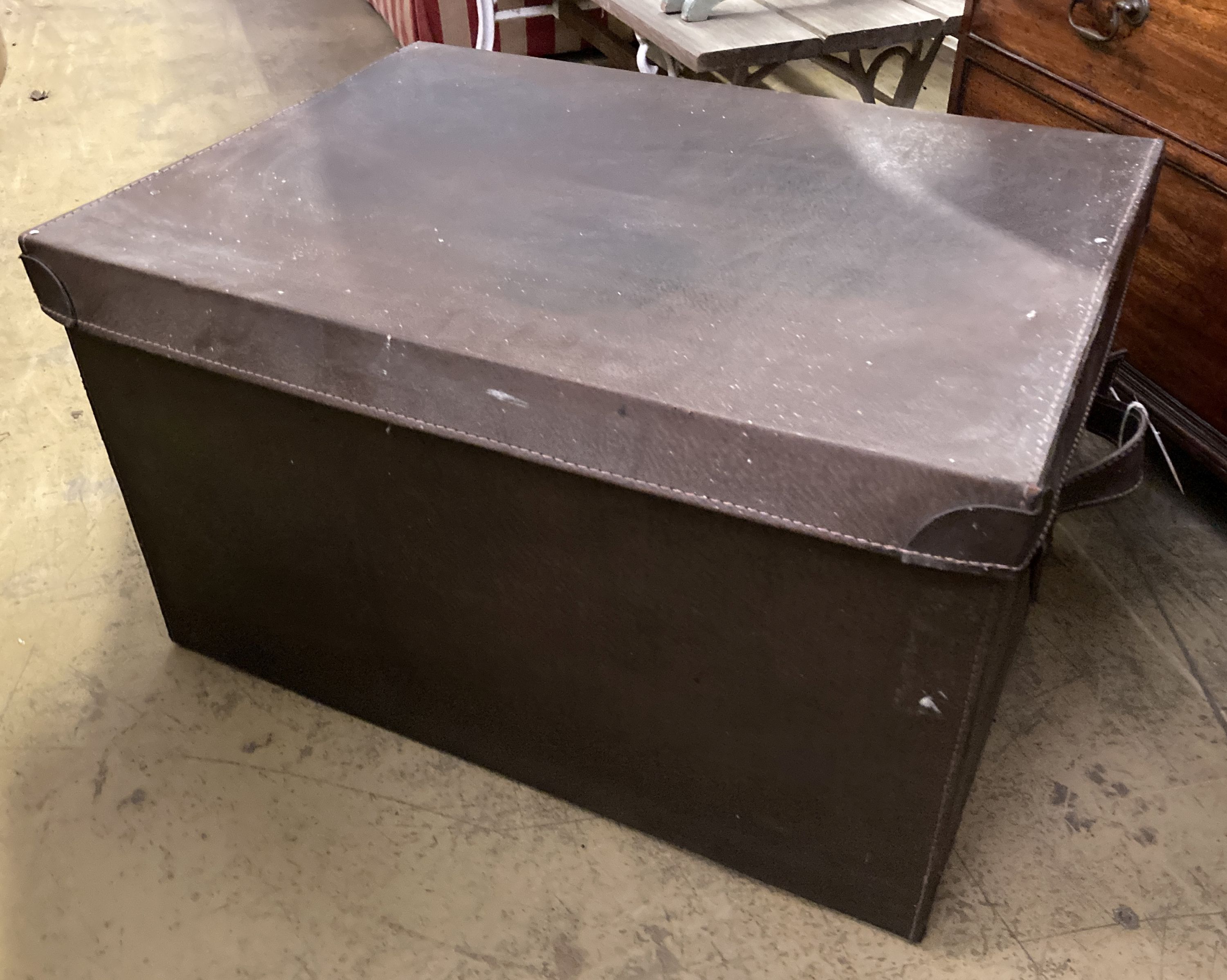 A rectangular brown leather trunk, length 70cm, depth 50cm, height 40cm